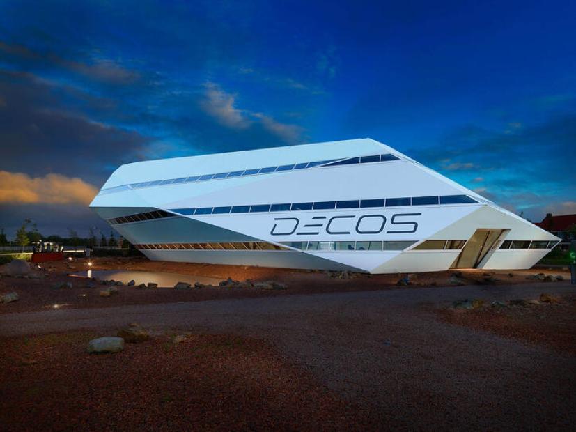 A futuristic building that is the office of Decos