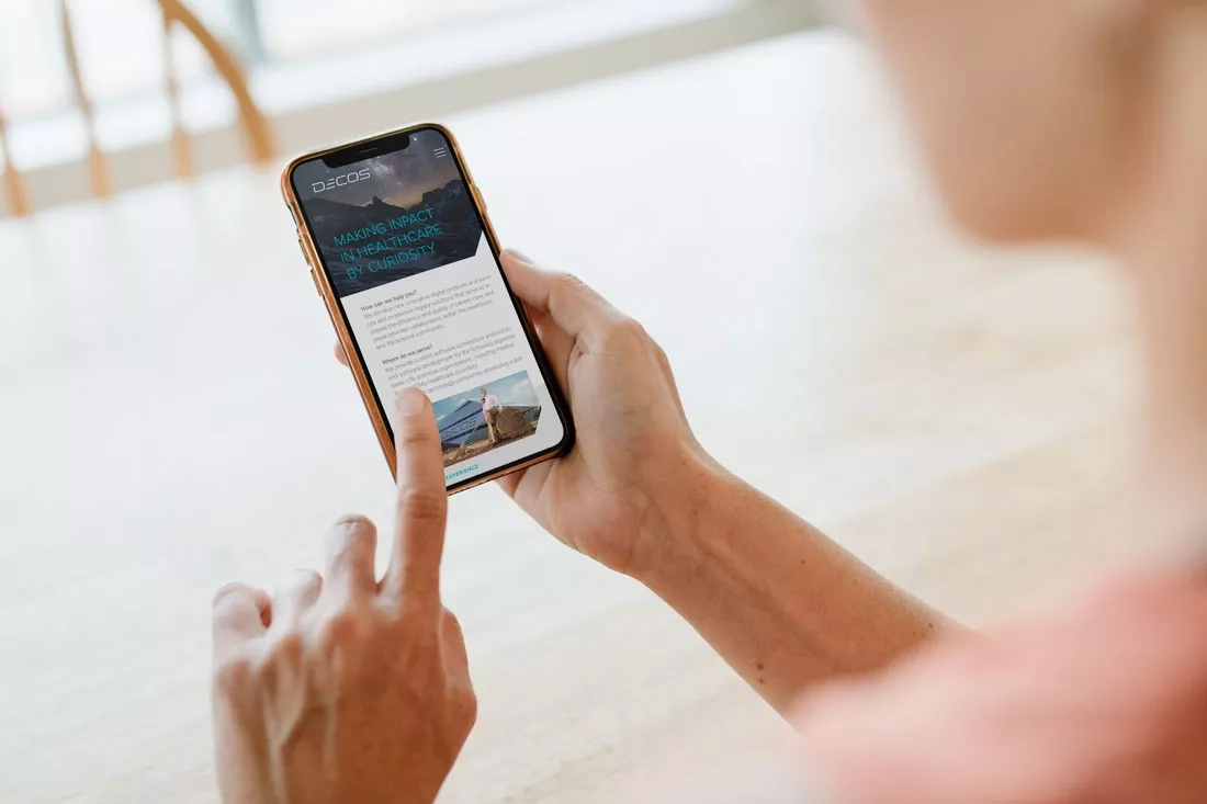hand scrolling the mobile page on iPhone